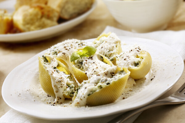 ricotta stuffed shells on a white plate